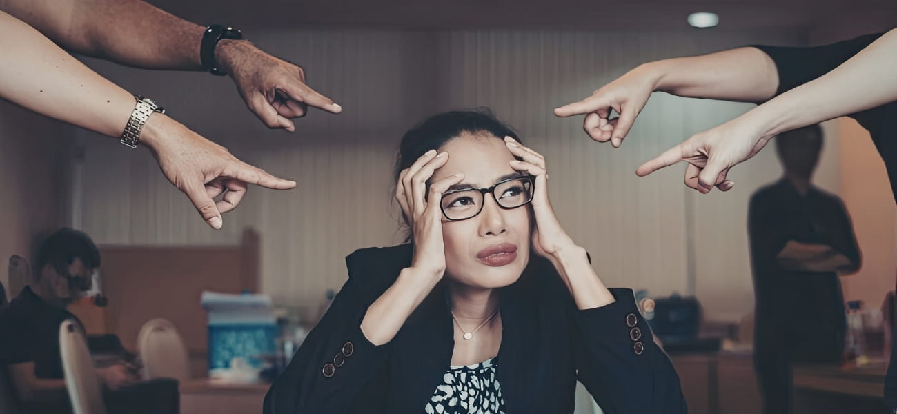 Woman struggling to focus at work due to ADHD symptoms