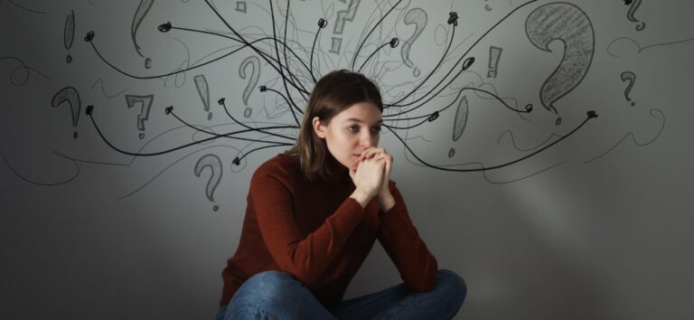 Woman experiencing intrusive thoughts and anxiety related to OCD