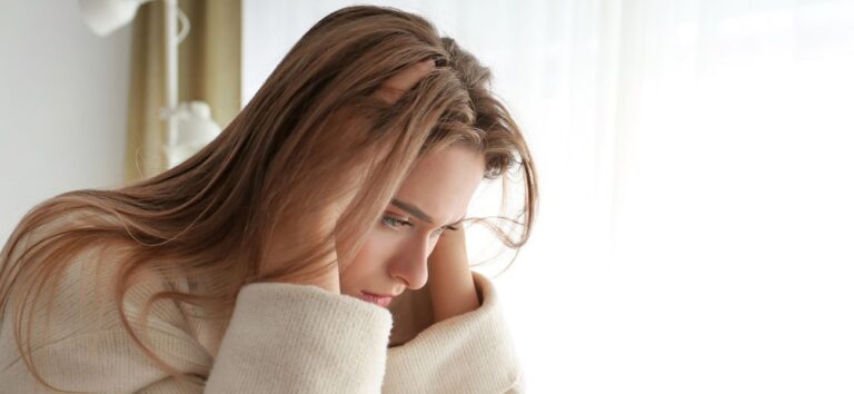 Woman experiencing low mood and emotional distress