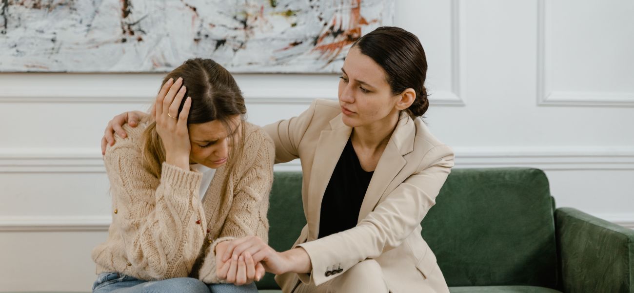 Friend providing emotional support during a conversation